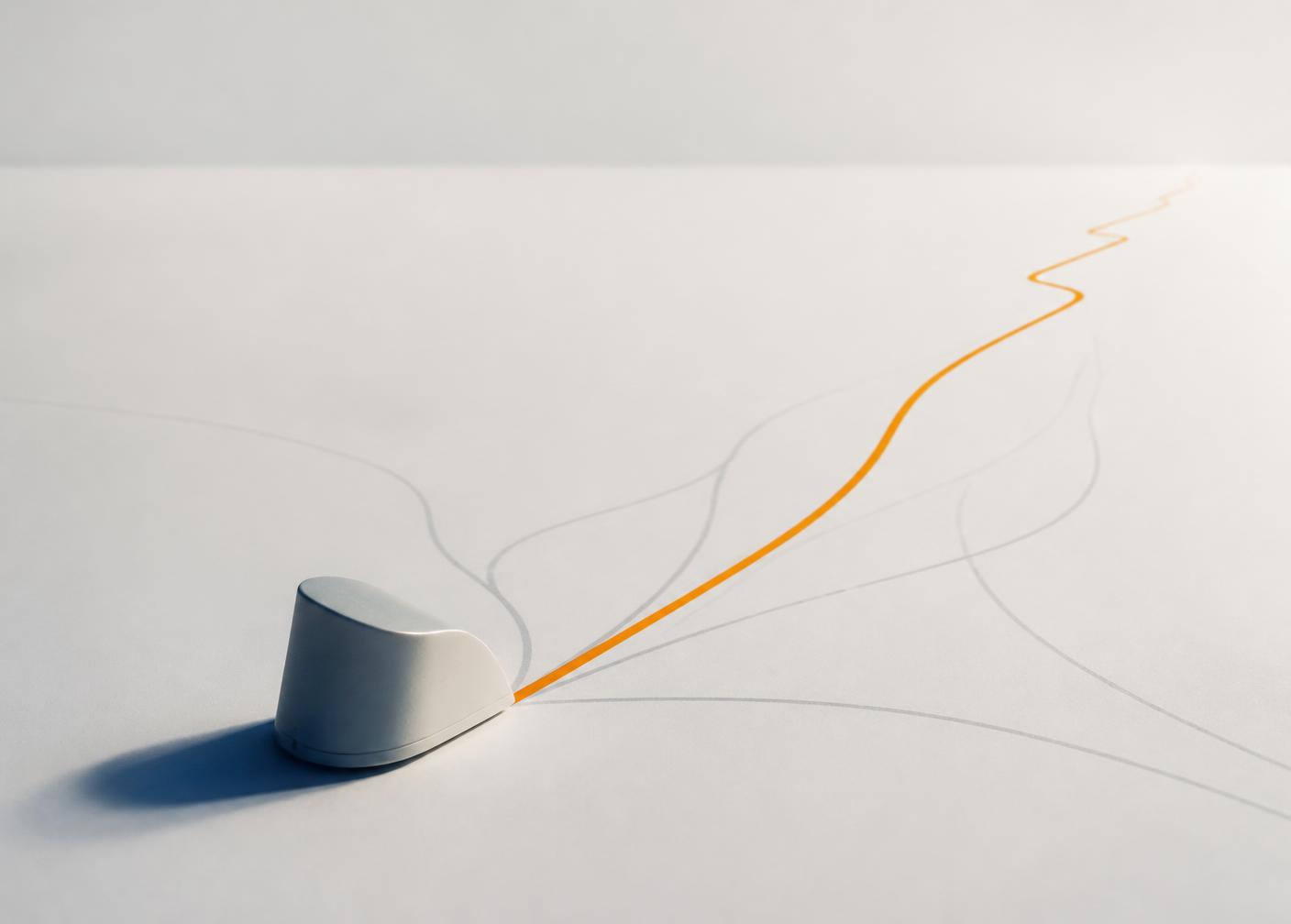 A single prototype on a pale surface with several faint paths diverging, one of which becomes a clear, defined line.